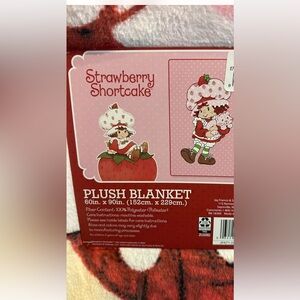 STRAWBERRY SHORTCAKE PLUSH THROW. BRAND NEW. 60 INCH X 90 INCH